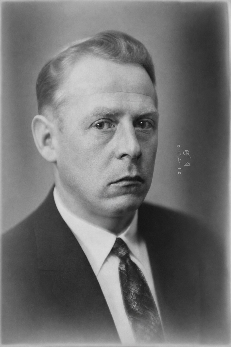 The same portrait, clean and unbroken, the missing corner filled with plain studio background